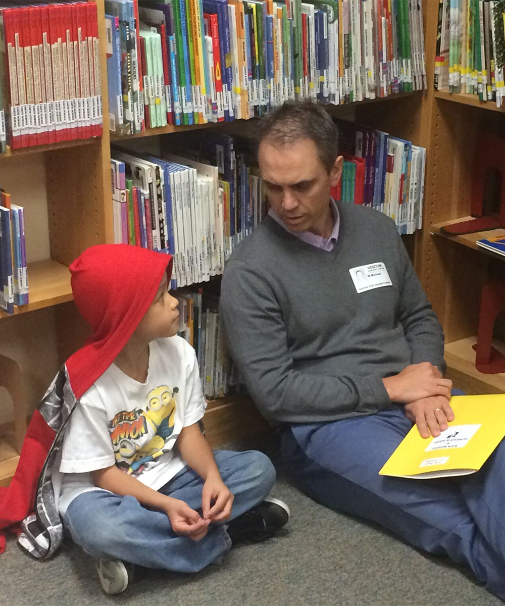 KS&R in the Community: Volunteering as Book Buddies Hero Image